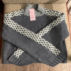 Brand new crop top sweater , is a Denim color. So can used with any jeans